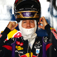 Vettel marks fourth title with gold helmet