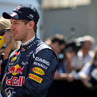 Vettel admits Ferrari interest is flattering
